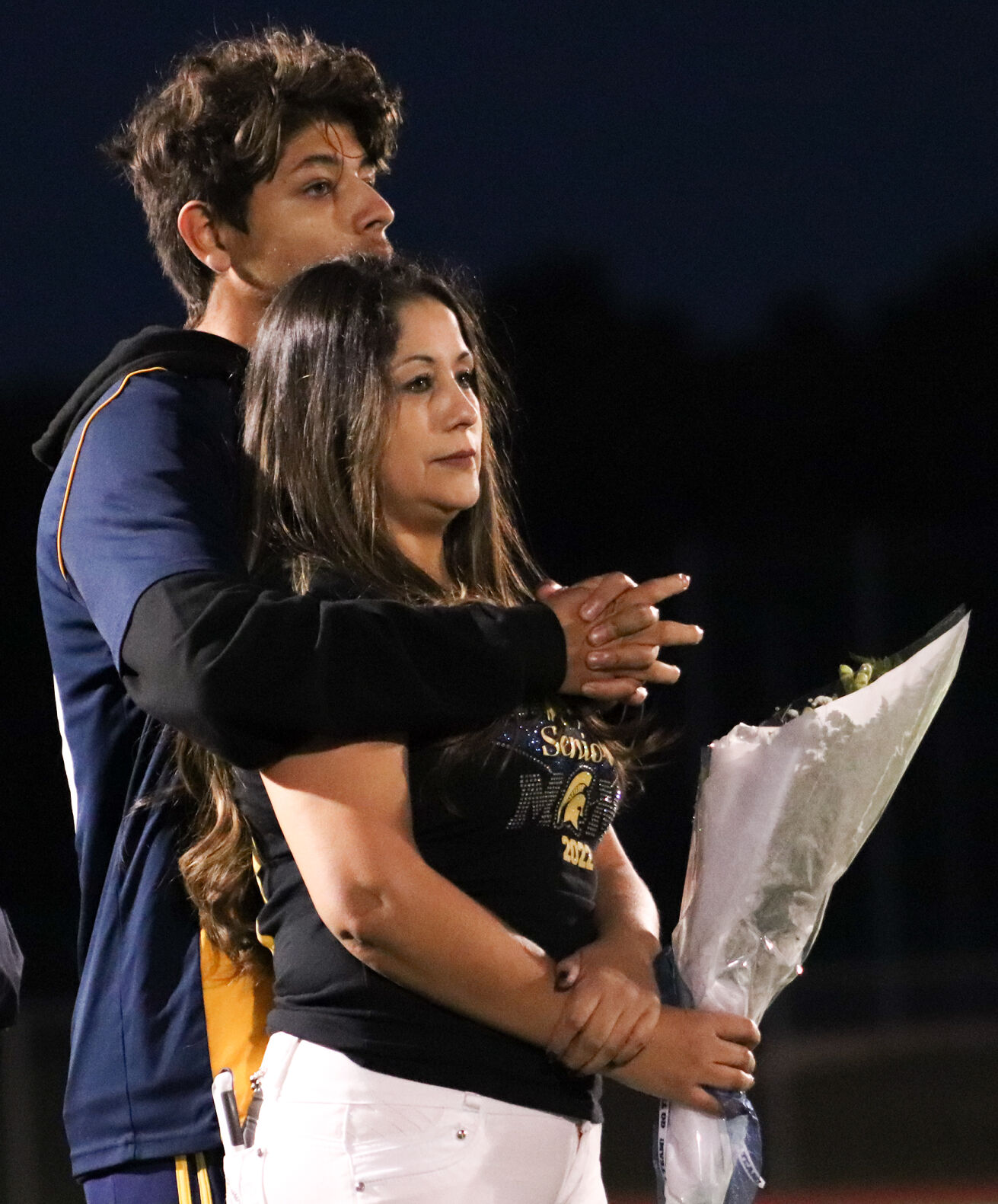 Battle senior Bryant Mendez hugs his mother